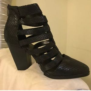 Kelsi dagger cut out caged ankle boots 7.5